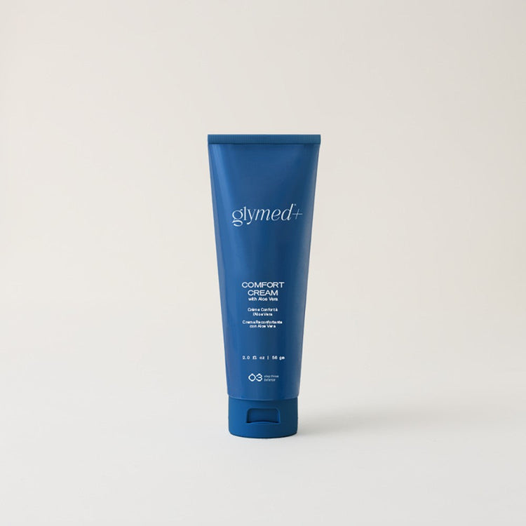 GlyMed Plus Comfort Cream with Aloe Vera in a navy squeeze tube, a step 3 barrier moisturizer stocked at The Glow Lab in Willoughby, Langley BC