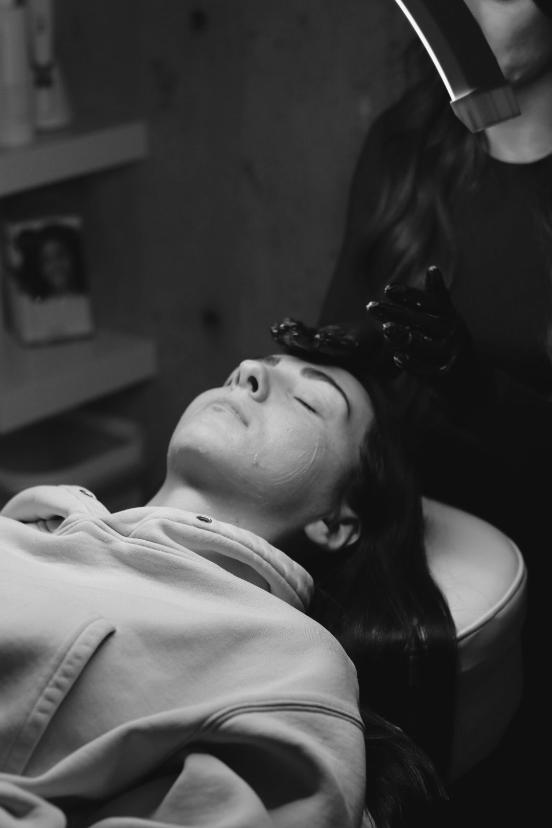 Client relaxing after a chemical peel at The Glow Lab, Langley BC